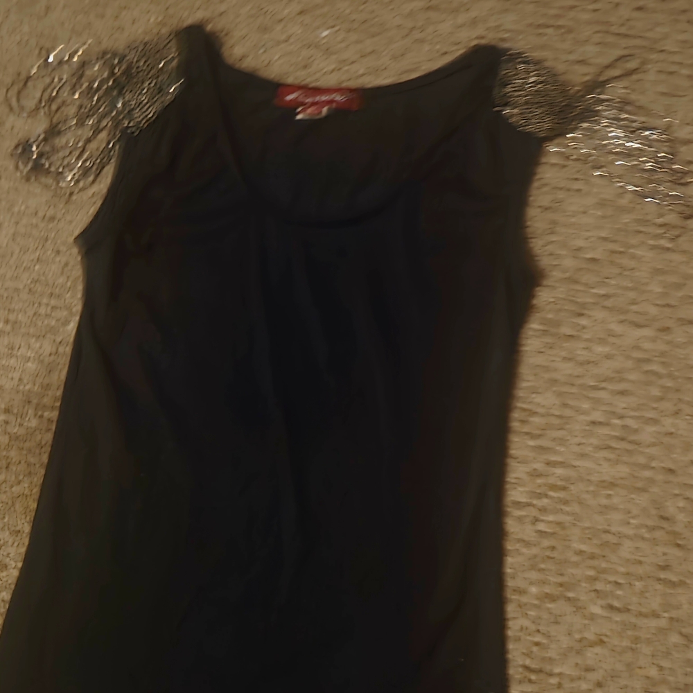 Elegant Black Sleeveless Top with Silver Accents